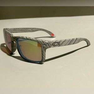 Oakley Sunglasses with Gray Frame and Iridescent Lenses